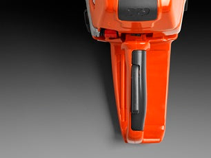 A Husqvarna 572 XP-24® Chainsaw with an orange body and a long metal cutting bar is perfect for all your outdoor needs. Shown from the side, it proudly displays the "Husqvarna" brand on the bar, along with intricate details of the engine and handle.