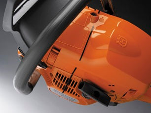 Image of a Husqvarna 3120 XP-42® Chainsaw with an orange body and a long silver blade, perfect for tackling outdoor tasks. The word "Husqvarna" and the Husqvarna logo are prominently displayed on the blade. The chainsaw has a black handguard, an ergonomic handle, and embodies power for any lawn or garden project.