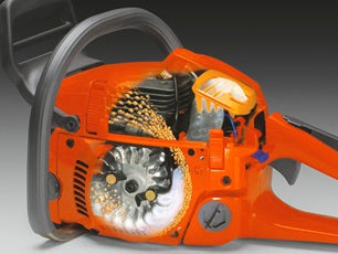 The Husqvarna 130 Chainsaw features a distinctive orange and gray design, complete with a prominent blade and handle, making it perfect for firewood pruning. The brand name "Husqvarna" is clearly visible on the blade.