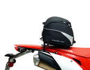 Image displaying components of the EVO-12 Bike-Pack Kit, featuring a black pack with an orange Ventura logo (top left), an EVO-Rack mounted on a bike with pannier support (top right), and a generic L-bracket with screws (bottom). Product for Honda CRF 450 L (2019).