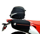 Image displaying components of the EVO-12 Bike-Pack Kit, featuring a black pack with an orange Ventura logo (top left), an EVO-Rack mounted on a bike with pannier support (top right), and a generic L-bracket with screws (bottom). Product for Honda CRF 450 L (2019).