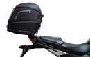 Image of a Ventura EVO-12 Bike-Pack Kit for Honda NC 750X (21 - >), featuring a black pack with orange detail. It includes an adjustable Pack-Rack for secure mounting, the EVO-Rack, and an L-bracket with hardware, all showcased in a generic image.