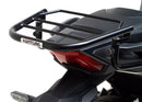 Image of a Ventura EVO-12 Bike-Pack Kit for Honda NC 750X (21 - >), featuring a black pack with orange detail. It includes an adjustable Pack-Rack for secure mounting, the EVO-Rack, and an L-bracket with hardware, all showcased in a generic image.
