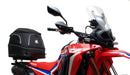 A collage featuring a sophisticated black Honda CRF 300L EVO-12 bike-pack with a bold red stripe, an EVO-RACK for secure mounting, and a standard L-bracket with screws. "Ventura EVO-12 Bike-Pack Kit" is prominently displayed at the top.
