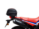 A collage featuring a sophisticated black Honda CRF 300L EVO-12 bike-pack with a bold red stripe, an EVO-RACK for secure mounting, and a standard L-bracket with screws. "Ventura EVO-12 Bike-Pack Kit" is prominently displayed at the top.