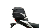 A labeled generic image displays a Honda CB750 Hornet (23 ->) Bike-Pack Kit by Ventura, featuring the versatile Sport-Rack, sleek black EVO-12 Pack with an orange stripe, innovative EVO-Rack for bikes, and handy L-Bracket—shown disassembled with screws.