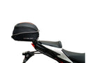 A labeled generic image displays a Honda CB750 Hornet (23 ->) Bike-Pack Kit by Ventura, featuring the versatile Sport-Rack, sleek black EVO-12 Pack with an orange stripe, innovative EVO-Rack for bikes, and handy L-Bracket—shown disassembled with screws.