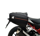 A labeled generic image displays a Honda CB750 Hornet (23 ->) Bike-Pack Kit by Ventura, featuring the versatile Sport-Rack, sleek black EVO-12 Pack with an orange stripe, innovative EVO-Rack for bikes, and handy L-Bracket—shown disassembled with screws.