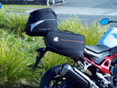 A labeled generic image displays a Honda CB750 Hornet (23 ->) Bike-Pack Kit by Ventura, featuring the versatile Sport-Rack, sleek black EVO-12 Pack with an orange stripe, innovative EVO-Rack for bikes, and handy L-Bracket—shown disassembled with screws.