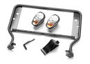 A set of Husqvarna front headlights on a black background, featuring a P525DX metal frame, amber-section turning lights, a bracket, black plastic cover, and small metal piece.