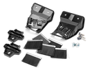 The Husqvarna Automower® Wheel Brush Kit includes black plastic brackets, small metal screws, four metal plates, and brush strips to help keep driving wheels clean and improve traction.