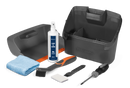 The Husqvarna Automower® Cleaning & Maintenance Kit includes a gray storage box, Care and Shine Spray, blue cloth, dustpan, white sponge, handle brush, detail brush, and screwdriver—everything you need for Automower® upkeep.