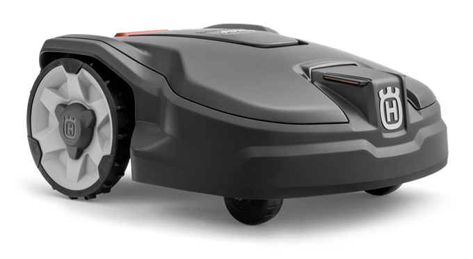 A sleek, black Husqvarna Automower AM 310 Mark II with the logo on its front. It features large, two-tone wheels and a compact, streamlined design suitable for automated grass cutting. Perfect for outdoor use, the mower has a low profile that enhances its maneuverability in various terrains.