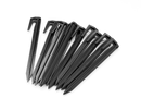 A set of Husqvarna Automower® Stakes—black plastic pegs with hooked tops, arranged in a fan shape on a white background—perfect for lawn installation projects.