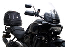 The image of the EVO-12 Bike-Pack Kit displays three components: a Ventura bike-pack with logo, an EVO-rack seamlessly attached to a Harley Davidson Pan America 1250 frame, and an L-bracket with screws and rods.