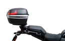 The image of the EVO-12 Bike-Pack Kit displays three components: a Ventura bike-pack with logo, an EVO-rack seamlessly attached to a Harley Davidson Pan America 1250 frame, and an L-bracket with screws and rods.
