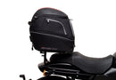 A labeled diagram displays the Ventura EVO-12 Bike-Pack Kit for Harley Davidson X 500 (24->), featuring an EVO-12 Pack (black bag), Adjustable Pack-Rack (rear rack), and a generic L-Bracket with screws and rods, all clearly labeled.