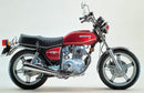 The Ventura EVO-12 Bike-Pack Kit for the Honda CB 400 T, Twin includes a stylish black bike pack with an orange stripe, paired with an EVO-Rack for easy mounting and an L-bracket with screws.