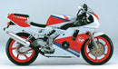 The Ventura Honda CBR 250 RRL Bike-Pack Kit includes a black pack with a logo and orange accent, an Evo-Rack for the rear wheel, and an L-Bracket. The Adjustable Pack-Rack ensures secure fastening of all components for versatile cycling adventures.