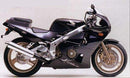 The image features a sleek black EVO-12 Bike-Pack Kit with a zipper, showcasing an adjustable Pack-Rack design. It includes an EVO rack mounted on a Honda CBR 400 RR N, with labeled L-brackets and screws as part of the versatile Top-Box Rack setup from Ventura.