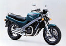The Ventura EVO-12 Bike-Pack Kit for Honda NTV 600 Revere (88 >) includes a soft bike pack, Top-Box Rack for motorcycle rear mounting, and labeled L-Brackets with screws, all shown on a white background.
