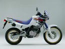 Image of a Ventura EVO-12 Bike-Pack Kit featuring a sleek black EVO-12 pack with a gray stripe, paired with the sturdy Evo-Rack and versatile L-Bracket mounting system. The durable metal components make it an ideal Top-Box Rack solution for Honda NX 650 P Dominator (93 >) adventures.