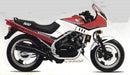 The Ventura EVO-12 Bike-Pack Kit for Honda VF 500 FE includes a black EVO-12 pack, a rear Evo-Rack mounted on the motorcycle, and an image of a black L-Bracket with screws, each part clearly labeled.