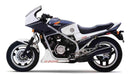 The Ventura Honda VF 750 FD, FE Bike-Pack Kit includes a black zippered pack with the "EVO-12 PACK" label, a sturdy Evo-Rack for secure mounting, and adaptable L-brackets with screws to upgrade your ride.
