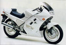 Image of the Ventura EVO-12 Bike-Pack Kit components: black EVO-12 pack with orange stripe, Evo-Rack with grill, and L-Bracket with screws for Honda VFR 750 FJ, FK (88 >). Each component is labeled in red text below its image.