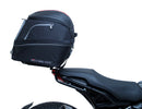 The EVO-12 Bike-Pack Kit offers a stylish Ventura EVO-12 pack with an orange stripe, an adjustable EVO-Rack on the frame, and a detailed L-Bracket with screws. Ideal for Indian FTR models (19 ->), it combines style and functionality for your rides.