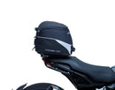 The EVO-12 Bike-Pack Kit offers a stylish Ventura EVO-12 pack with an orange stripe, an adjustable EVO-Rack on the frame, and a detailed L-Bracket with screws. Ideal for Indian FTR models (19 ->), it combines style and functionality for your rides.