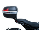 The EVO-12 Bike-Pack Kit offers a stylish Ventura EVO-12 pack with an orange stripe, an adjustable EVO-Rack on the frame, and a detailed L-Bracket with screws. Ideal for Indian FTR models (19 ->), it combines style and functionality for your rides.