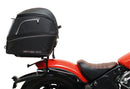 Image featuring a Ventura EVO-12 bike-pack kit for Indian Scout Bobber models, including an EVO-12 pack, Top-Box Rack, and L-bracket with screws. The black pack showcases a logo, while the adjustable rack fits on the bike's rear. A perfect setup for your biking needs.