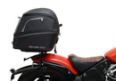 Image featuring a Ventura EVO-12 bike-pack kit for Indian Scout Bobber models, including an EVO-12 pack, Top-Box Rack, and L-bracket with screws. The black pack showcases a logo, while the adjustable rack fits on the bike's rear. A perfect setup for your biking needs.