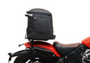 Image featuring a Ventura EVO-12 bike-pack kit for Indian Scout Bobber models, including an EVO-12 pack, Top-Box Rack, and L-bracket with screws. The black pack showcases a logo, while the adjustable rack fits on the bike's rear. A perfect setup for your biking needs.