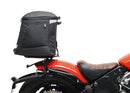 Image featuring a Ventura EVO-12 bike-pack kit for Indian Scout Bobber models, including an EVO-12 pack, Top-Box Rack, and L-bracket with screws. The black pack showcases a logo, while the adjustable rack fits on the bike's rear. A perfect setup for your biking needs.