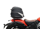 Image featuring a Ventura EVO-12 bike-pack kit for Indian Scout Bobber models, including an EVO-12 pack, Top-Box Rack, and L-bracket with screws. The black pack showcases a logo, while the adjustable rack fits on the bike's rear. A perfect setup for your biking needs.