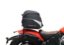 Image featuring a Ventura EVO-12 bike-pack kit for Indian Scout Bobber models, including an EVO-12 pack, Top-Box Rack, and L-bracket with screws. The black pack showcases a logo, while the adjustable rack fits on the bike's rear. A perfect setup for your biking needs.