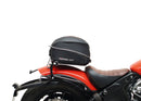 Image featuring a Ventura EVO-12 bike-pack kit for Indian Scout Bobber models, including an EVO-12 pack, Top-Box Rack, and L-bracket with screws. The black pack showcases a logo, while the adjustable rack fits on the bike's rear. A perfect setup for your biking needs.