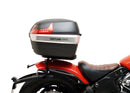Image featuring a Ventura EVO-12 bike-pack kit for Indian Scout Bobber models, including an EVO-12 pack, Top-Box Rack, and L-bracket with screws. The black pack showcases a logo, while the adjustable rack fits on the bike's rear. A perfect setup for your biking needs.