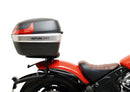 Image featuring a Ventura EVO-12 bike-pack kit for Indian Scout Bobber models, including an EVO-12 pack, Top-Box Rack, and L-bracket with screws. The black pack showcases a logo, while the adjustable rack fits on the bike's rear. A perfect setup for your biking needs.