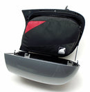 Two black Ventura PANNIER BIKE-PACK KIT bags with red accents and handles are side by side, one slightly in front. These sleek, rectangular motorcycle luggage solutions perfectly fit with Ventura Pannier Frames for an adventurous ride.