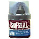 A small Sno-Seal Can - Brown is shown with a red label featuring "Sno-Seal" in white text. It reads "Colors and Seals Scuffs and Abrasions," perfect for leather protection. The 3.5 oz container has a clear lid.