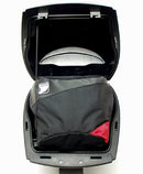 Two black Ventura PANNIER BIKE-PACK KIT bags with red accents and handles are side by side, one slightly in front. These sleek, rectangular motorcycle luggage solutions perfectly fit with Ventura Pannier Frames for an adventurous ride.