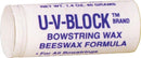 A white cylindrical stick of Sno-Seal U.V. Block/Bow String Wax features a beeswax formula and blue labeling. This 1.4 oz (40 grams) container is ideal for bow hunting, providing ultraviolet absorbent protection for all your bowstrings.