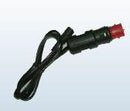 A coiled black Keis audio cable, categorized under Accessories, features red and black connectors. It's placed on a light surface with a visible shadow.