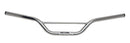 The Ventura Off Road Bars - 7/8" are silver and feature a black grip on each end, with a supporting center bar. The slightly raised, curved design provides ergonomic handling and includes a small manufacturer's label for identification.