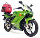 The image showcases a Ventura EVO-12 Bike-Pack Kit, featuring a sleek black EVO-12 pack, an installed EVO-Rack also serving as a Top-Box Rack, and L-brackets with screws. The versatile Adjustable Pack-Rack securely mounts your gear on the Kawasaki KR 150 RR (2003).