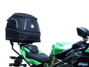 The image showcases the Ventura EVO-12 Bike-Pack Kit on a Kawasaki ZX-6R Ninja (19 ->) featuring a sleek black pack with an orange stripe, secured by the versatile Adjustable Pack-Rack and robust black L-Bracket hardware.