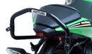 The image showcases the Ventura EVO-12 Bike-Pack Kit on a Kawasaki ZX-6R Ninja (19 ->) featuring a sleek black pack with an orange stripe, secured by the versatile Adjustable Pack-Rack and robust black L-Bracket hardware.